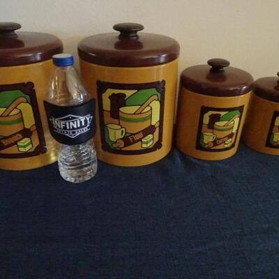 LOT 480. VINTAGE METAL CANISTER SET
