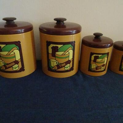 LOT 480. VINTAGE METAL CANISTER SET