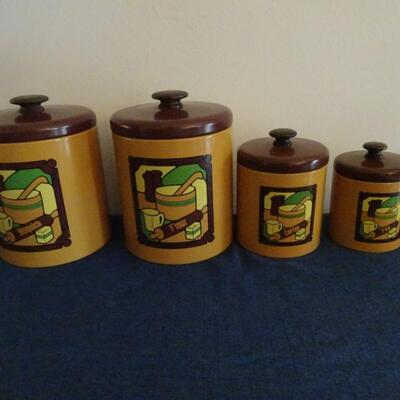 LOT 480. VINTAGE METAL CANISTER SET