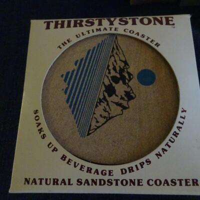 LOT 484. CANDLES AND COASTER SET