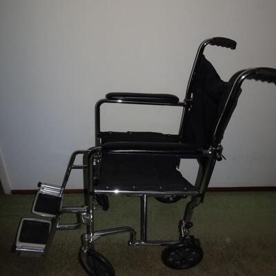 LOT 497. WHEEL CHAIR