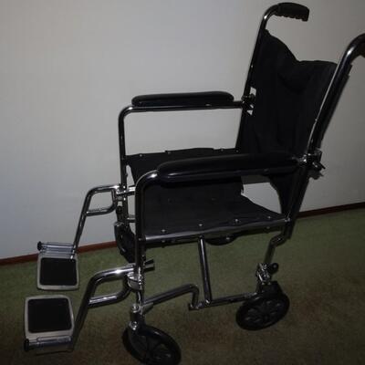LOT 497. WHEEL CHAIR