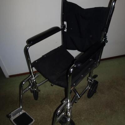 LOT 497. WHEEL CHAIR