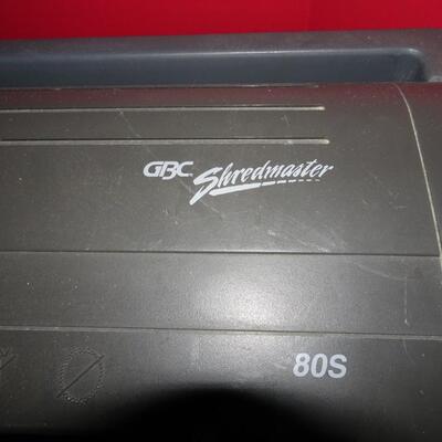 LOT 498. SHREDDER, BRIEFCASE AND FILE