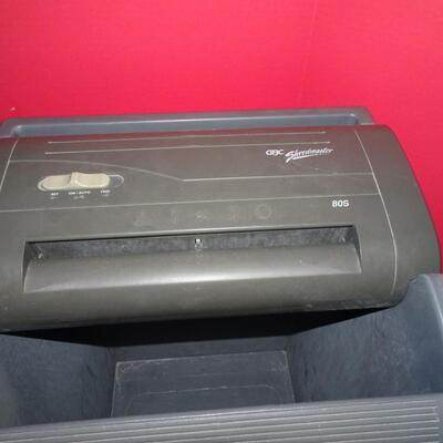 LOT 498. SHREDDER, BRIEFCASE AND FILE