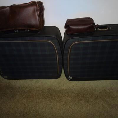LOT 499. VINTAGE LEEDS PLAID SUITCASES