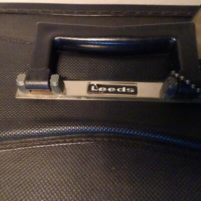 LOT 499. VINTAGE LEEDS PLAID SUITCASES