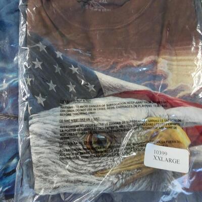 LOT 525.      FIVE XXL MENS T SHIRTS STILL IN PACKAGE