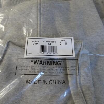 LOT 528. 2  XL SWEAT PANTS SHORTS  AND 2 SHORTS  STILL IN PACKAGE