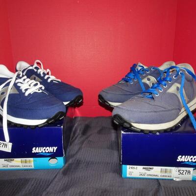 LOT 542.  TWO PAIR SAUCONY SIZE 10 SHOES