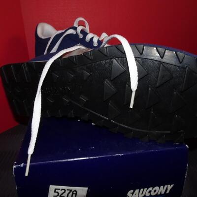 LOT 542.  TWO PAIR SAUCONY SIZE 10 SHOES