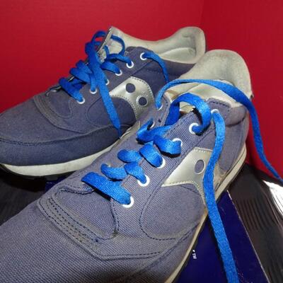 LOT 542.  TWO PAIR SAUCONY SIZE 10 SHOES
