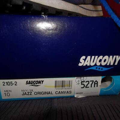 LOT 542.  TWO PAIR SAUCONY SIZE 10 SHOES