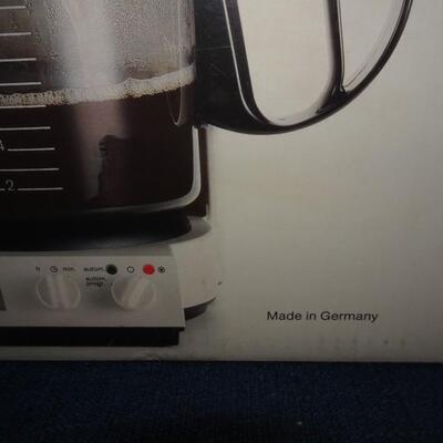 LOT 571. BRAUN COFFEE MAKER AND FILTERS