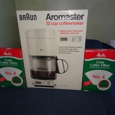 LOT 571. BRAUN COFFEE MAKER AND FILTERS