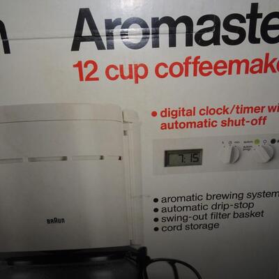 LOT 571. BRAUN COFFEE MAKER AND FILTERS
