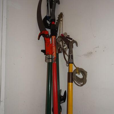 LOT 566. THREE EXTENSION PRUNERS