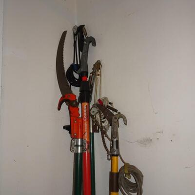 LOT 566. THREE EXTENSION PRUNERS