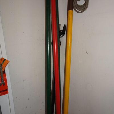 LOT 566. THREE EXTENSION PRUNERS
