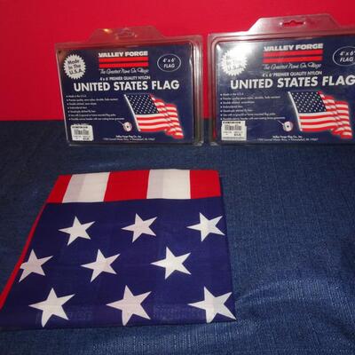LOT 578. TWO VALLEY FORGE USA FLAGS. 4' X 6' STILL IN BOX PLUS OTHER USA FLAG