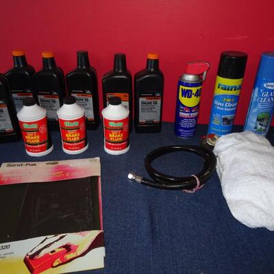 LOT 583. CLEANERS AND OILS MOST FULL