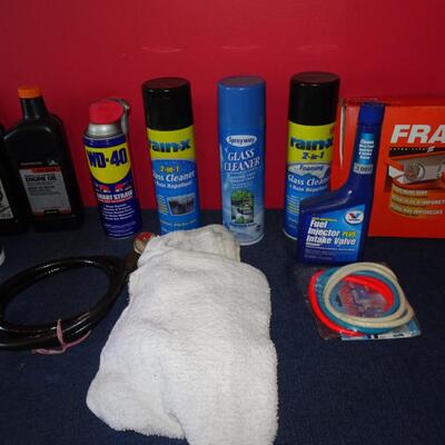 LOT 583. CLEANERS AND OILS MOST FULL