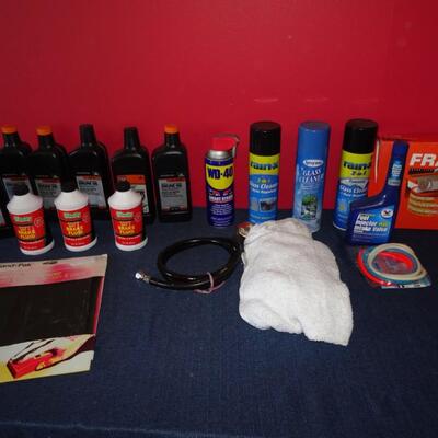 LOT 583. CLEANERS AND OILS MOST FULL