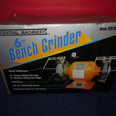 LOT 584. BENCH GRINDER STILL IN BOX