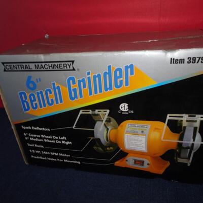 LOT 584. BENCH GRINDER STILL IN BOX