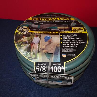 LOT 585.    100 FOOT WATER HOSE