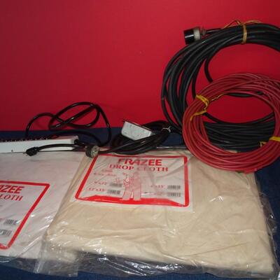 LOT 589. TWO DROP CLOTHS IN PACKAGE AND EXTENSION CORDS