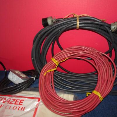 LOT 589. TWO DROP CLOTHS IN PACKAGE AND EXTENSION CORDS