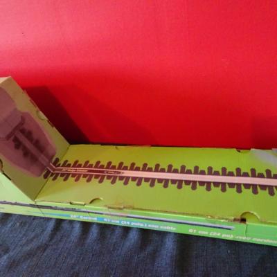 LOT 590.  HEDGE TRIMMER IN BOX
