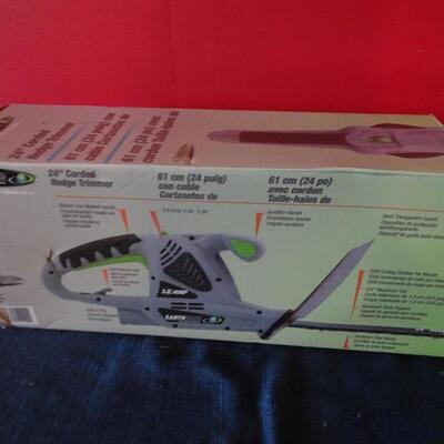 LOT 590.  HEDGE TRIMMER IN BOX