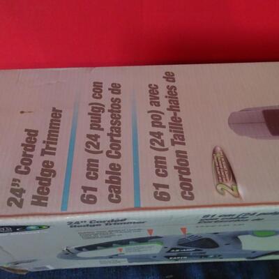 LOT 590.  HEDGE TRIMMER IN BOX