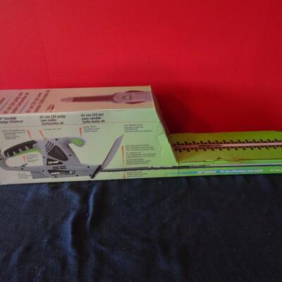 LOT 590.  HEDGE TRIMMER IN BOX