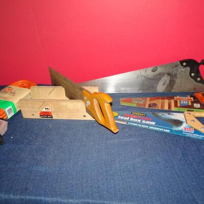 LOT 598   FOUR SAWS AND TWO POWER CORDS