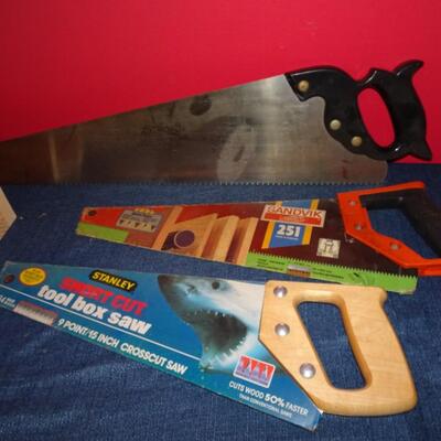 LOT 598   FOUR SAWS AND TWO POWER CORDS