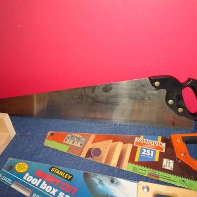 LOT 598   FOUR SAWS AND TWO POWER CORDS