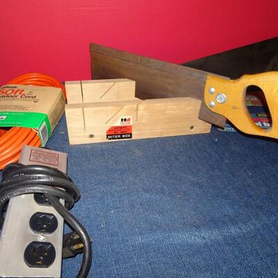 LOT 598   FOUR SAWS AND TWO POWER CORDS