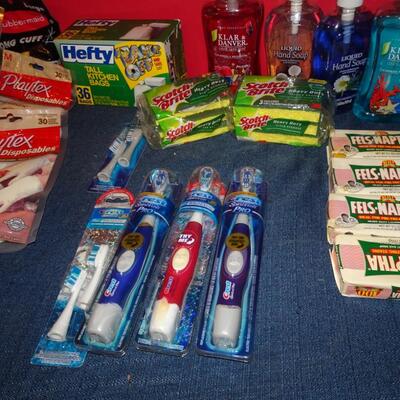 LOT 606. CLEANING SUPPLIES AND TOOTH BRUSHES