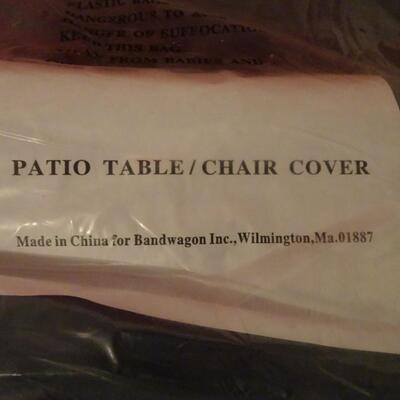 LOT 612. FOUR PATIO CHAIR COVERS