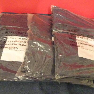 LOT 612. FOUR PATIO CHAIR COVERS