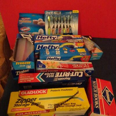 LOT 617. PLASTIC BAGS, TOOTH BRUSHES, MATCHES