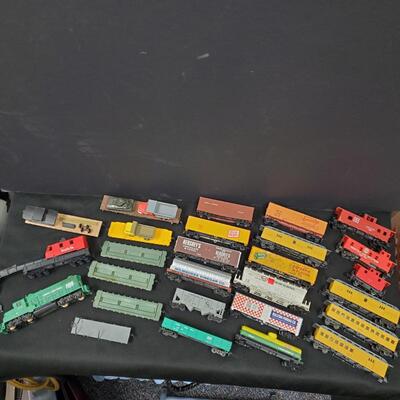 Penn Central HO Scale Model Train cars and signage
