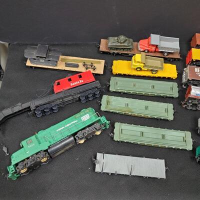 Penn Central HO Scale Model Train cars and signage