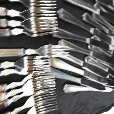 Stainless Steel Silverware: 26 Forks, 30 Knives
