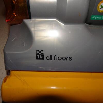 LOT 631. DYSON VACUUM. DC 14 ALL FLOORS