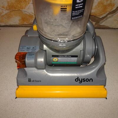 LOT 631. DYSON VACUUM. DC 14 ALL FLOORS