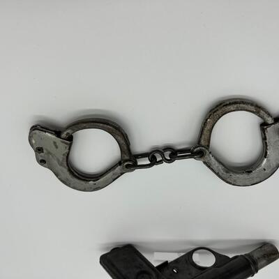 Lot of 1920s Toy Kids Cast Iron Handcuffs and 1928 Daisy No 71 Repeater Water Gun